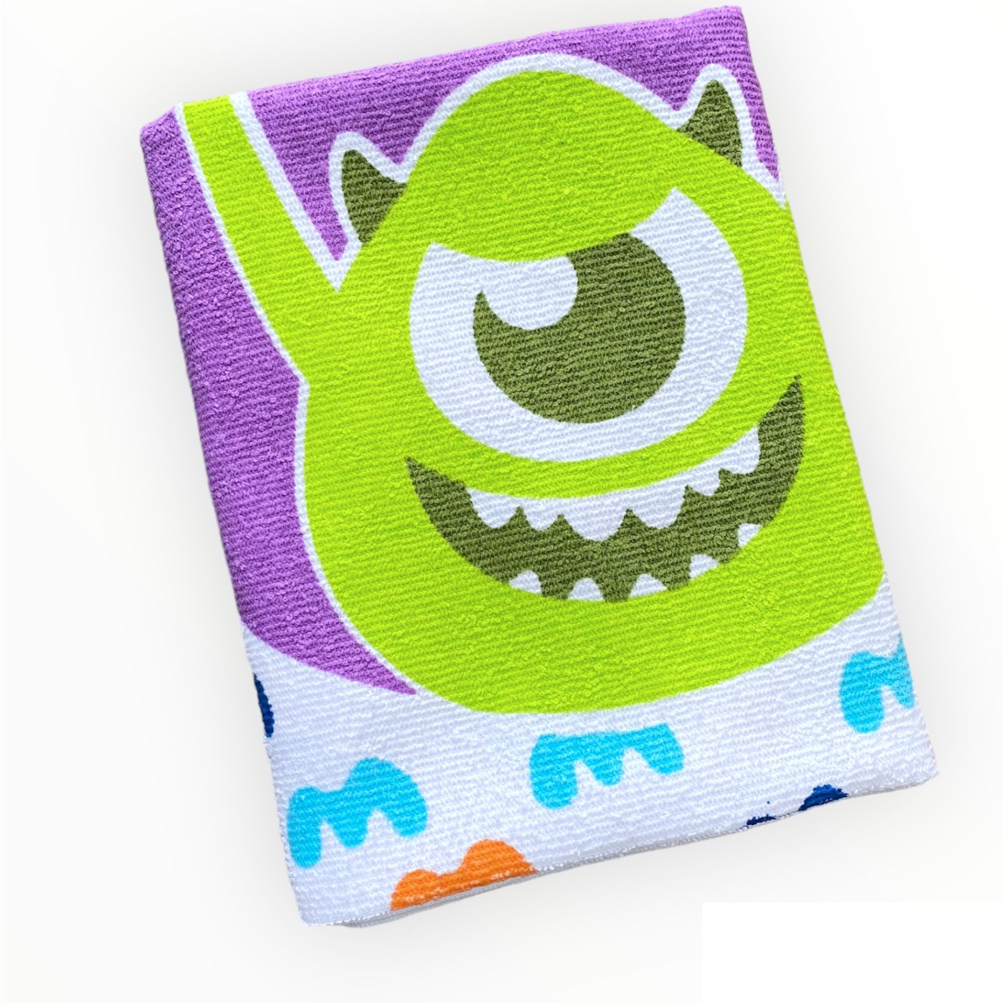 Toalla infantil Monster INC de 60 x 120 cm.